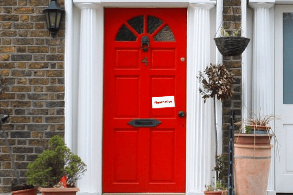 Red front door. Taped to the front door is an eviction letter that says “Final notice” in red.